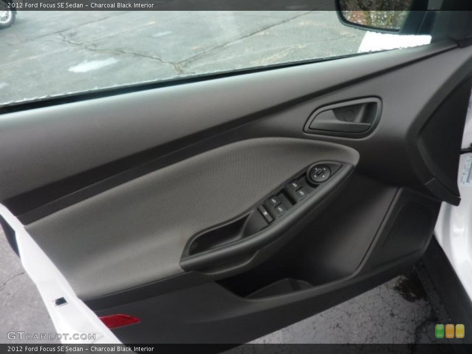 Charcoal Black Interior Door Panel for the 2012 Ford Focus SE Sedan #47596481