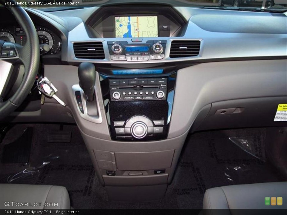 Beige Interior Controls for the 2011 Honda Odyssey EX-L #47610728