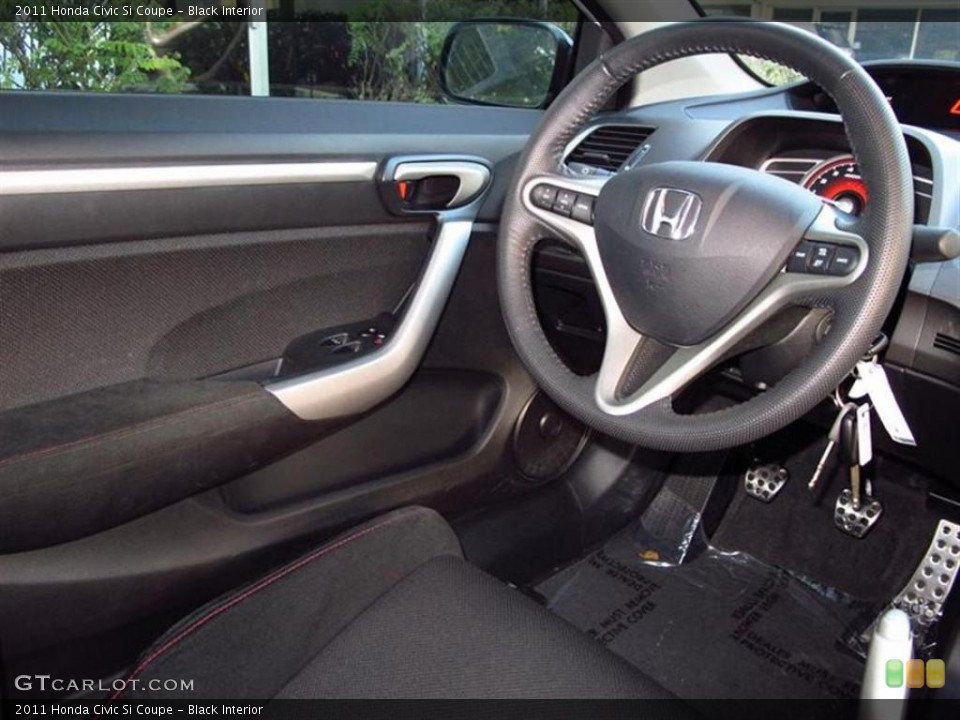 Black Interior Steering Wheel for the 2011 Honda Civic Si Coupe #47611973