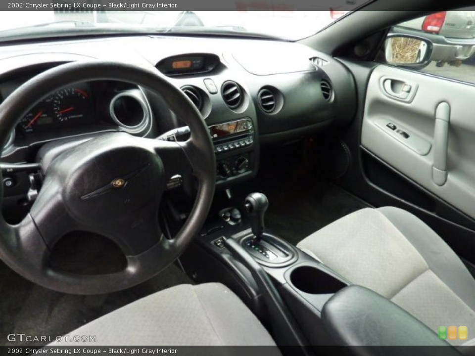 Black/Light Gray Interior Prime Interior for the 2002 Chrysler Sebring LX Coupe #47639485