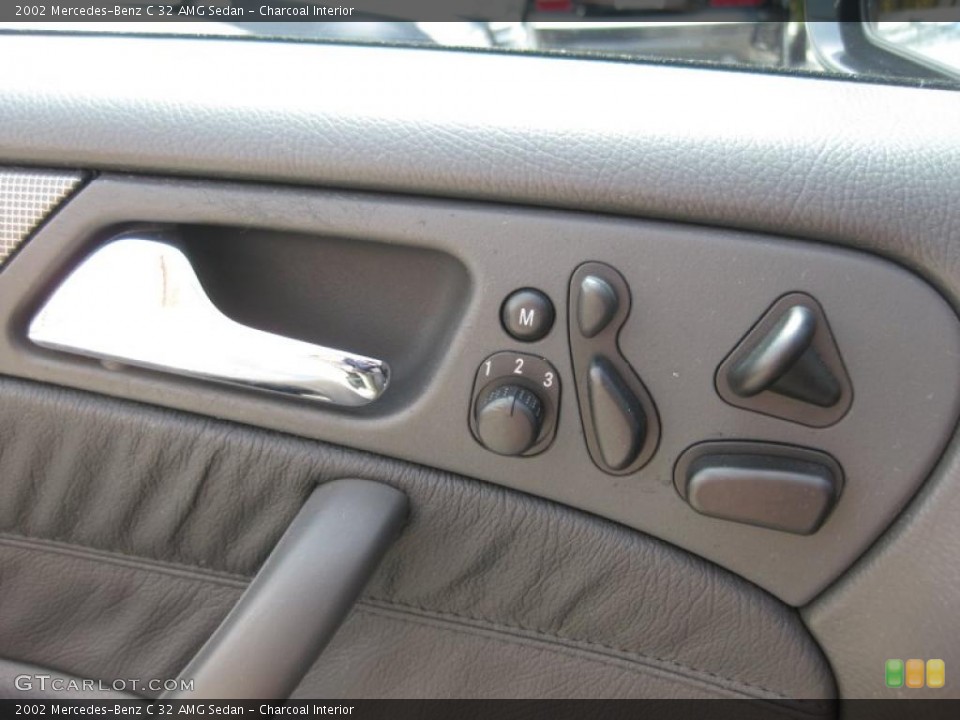 Charcoal Interior Controls for the 2002 Mercedes-Benz C 32 AMG Sedan #47667649
