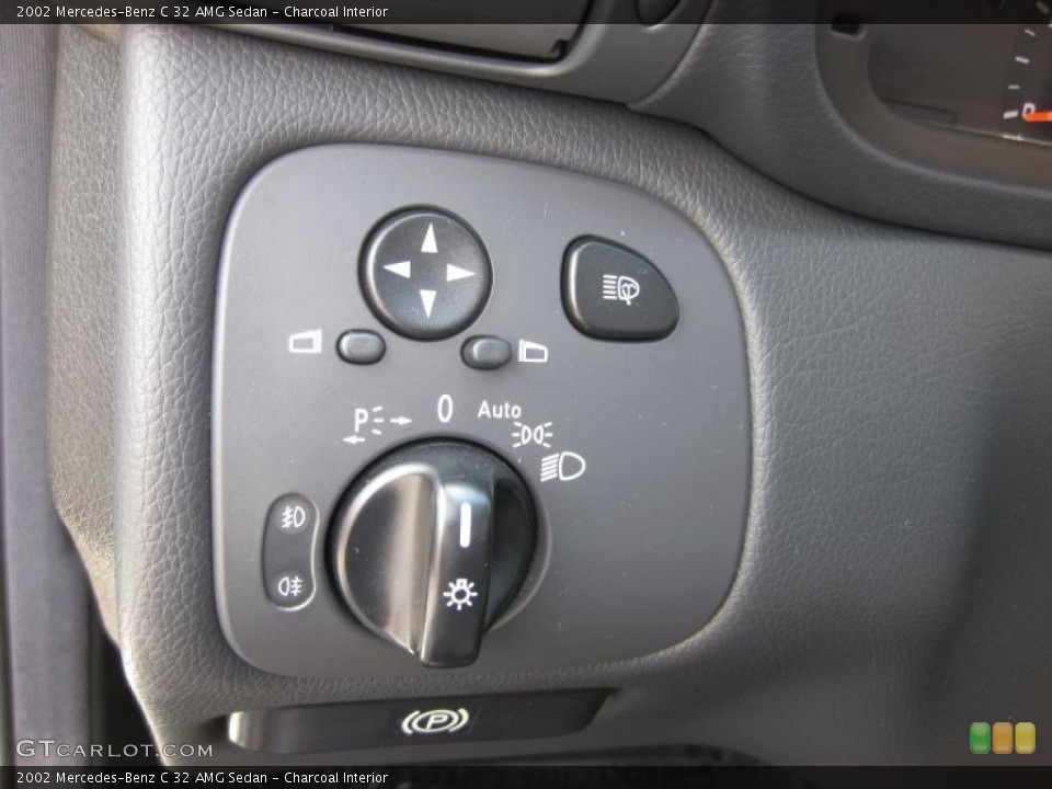 Charcoal Interior Controls for the 2002 Mercedes-Benz C 32 AMG Sedan #47667679