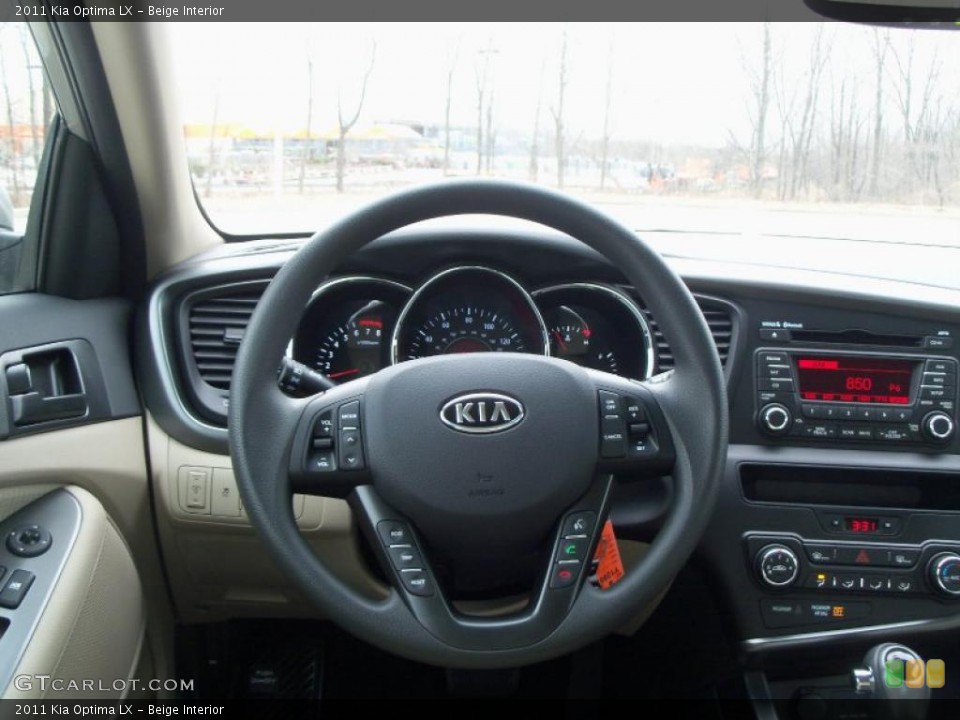 Beige Interior Dashboard for the 2011 Kia Optima LX #47677762