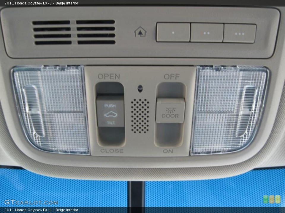 Beige Interior Controls for the 2011 Honda Odyssey EX-L #47694321