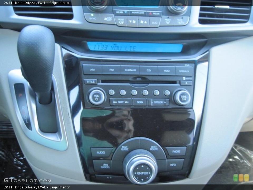 Beige Interior Controls for the 2011 Honda Odyssey EX-L #47694333