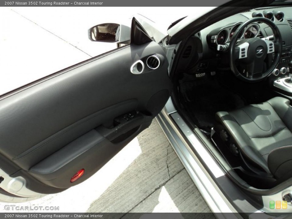 Charcoal Interior Door Panel for the 2007 Nissan 350Z Touring Roadster #47708324