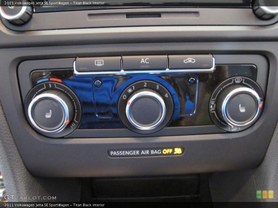 Titan Black Interior Controls for the 2011 Volkswagen Jetta SE SportWagen #47711520