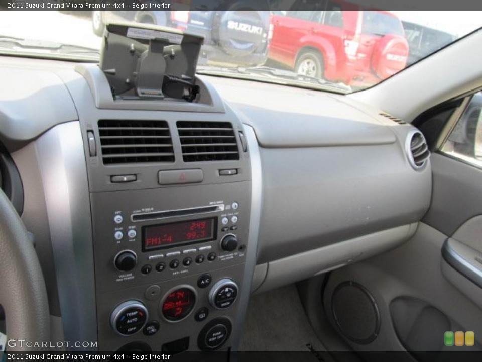 Beige Interior Dashboard for the 2011 Suzuki Grand Vitara Premium 4x4 #47712123