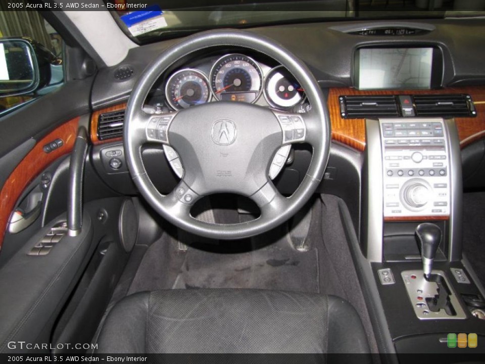 Ebony Interior Dashboard for the 2005 Acura RL 3.5 AWD Sedan #47736136