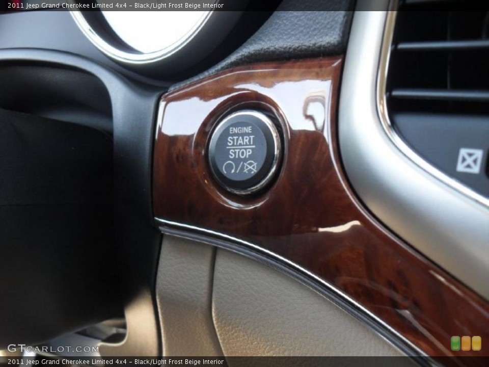 Black/Light Frost Beige Interior Controls for the 2011 Jeep Grand Cherokee Limited 4x4 #47738512