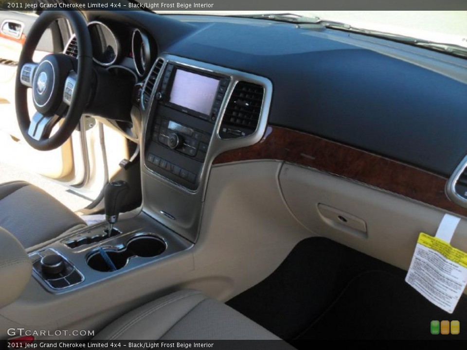 Black/Light Frost Beige Interior Dashboard for the 2011 Jeep Grand Cherokee Limited 4x4 #47738635