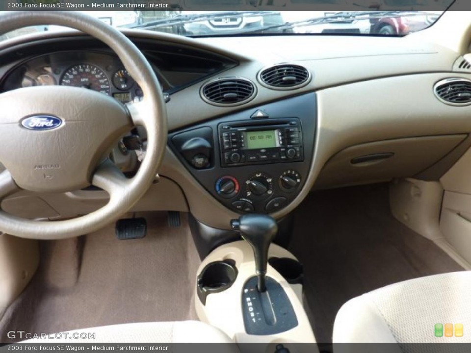 Medium Parchment Interior Dashboard for the 2003 Ford Focus SE Wagon #47741065