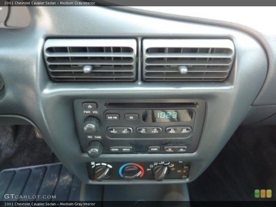 Medium Gray Interior Controls for the 2001 Chevrolet Cavalier Sedan #47741287