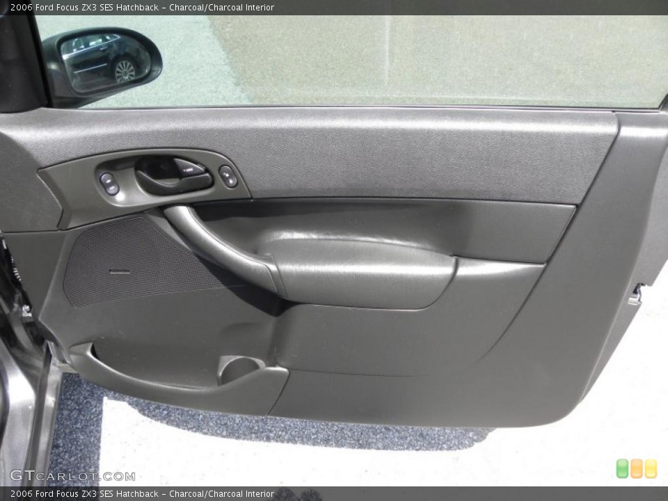 Charcoal/Charcoal Interior Door Panel for the 2006 Ford Focus ZX3 SES Hatchback #47778627