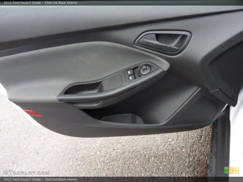 Charcoal Black Interior Door Panel for the 2012 Ford Focus S Sedan #47784558