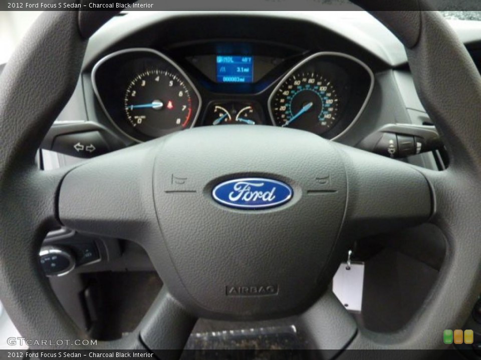 Charcoal Black Interior Steering Wheel for the 2012 Ford Focus S Sedan #47784657