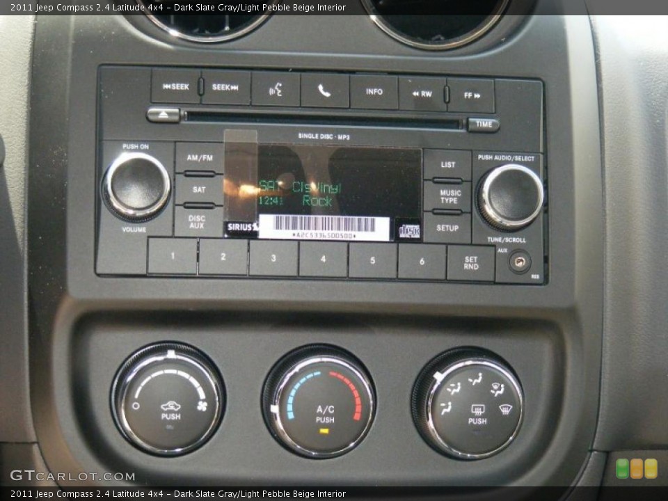 Dark Slate Gray/Light Pebble Beige Interior Controls for the 2011 Jeep Compass 2.4 Latitude 4x4 #47788254