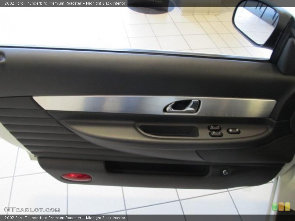 Midnight Black Interior Door Panel for the 2002 Ford Thunderbird Premium Roadster #47793955