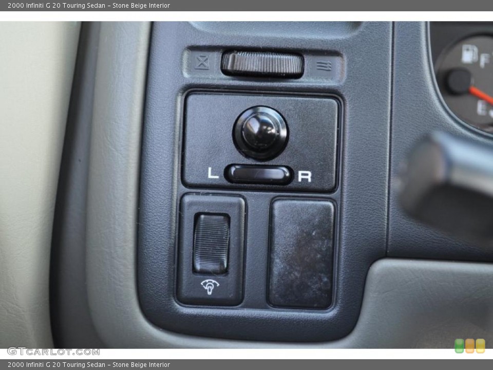 Stone Beige Interior Controls for the 2000 Infiniti G 20 Touring Sedan #47851958
