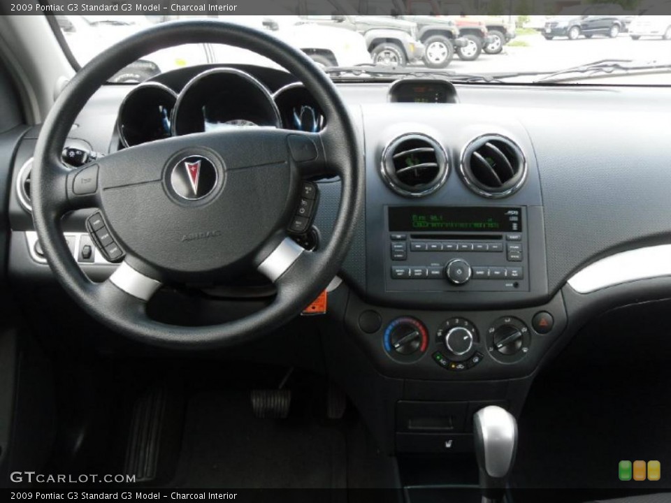 Charcoal Interior Dashboard for the 2009 Pontiac G3  #47864131