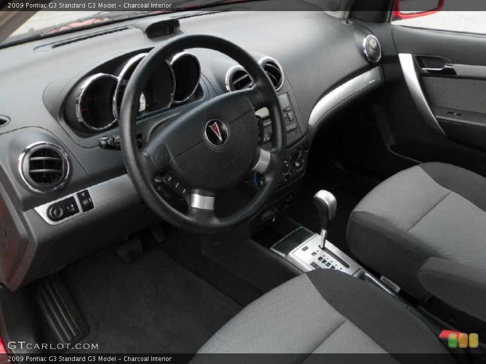 Charcoal Interior Prime Interior for the 2009 Pontiac G3  #47864221