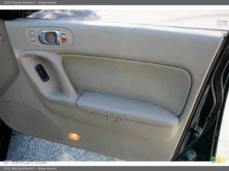 Beige Interior Door Panel for the 2002 Mazda Millenia S #47874080
