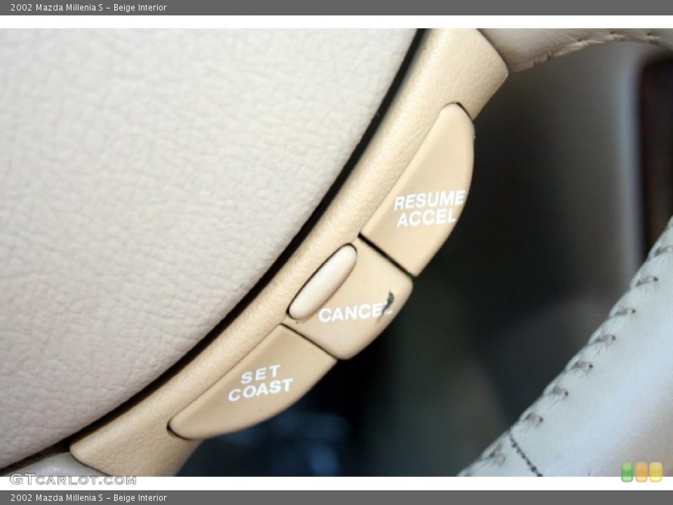 Beige Interior Controls for the 2002 Mazda Millenia S #47874653