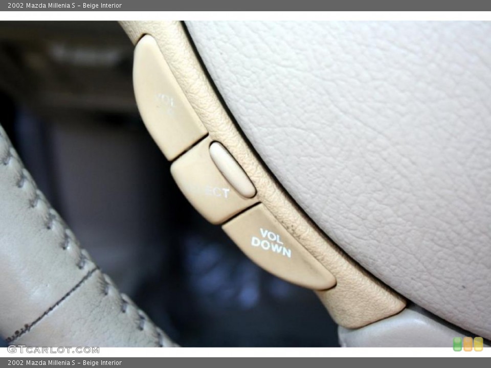 Beige Interior Controls for the 2002 Mazda Millenia S #47874665