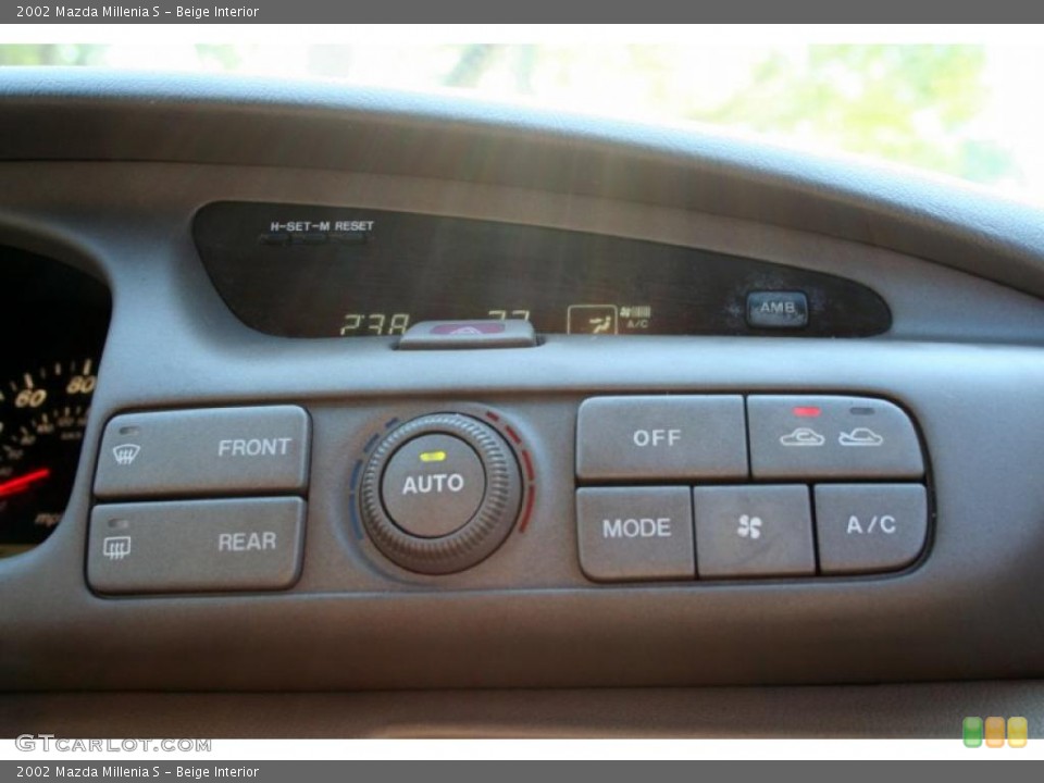 Beige Interior Controls for the 2002 Mazda Millenia S #47874719