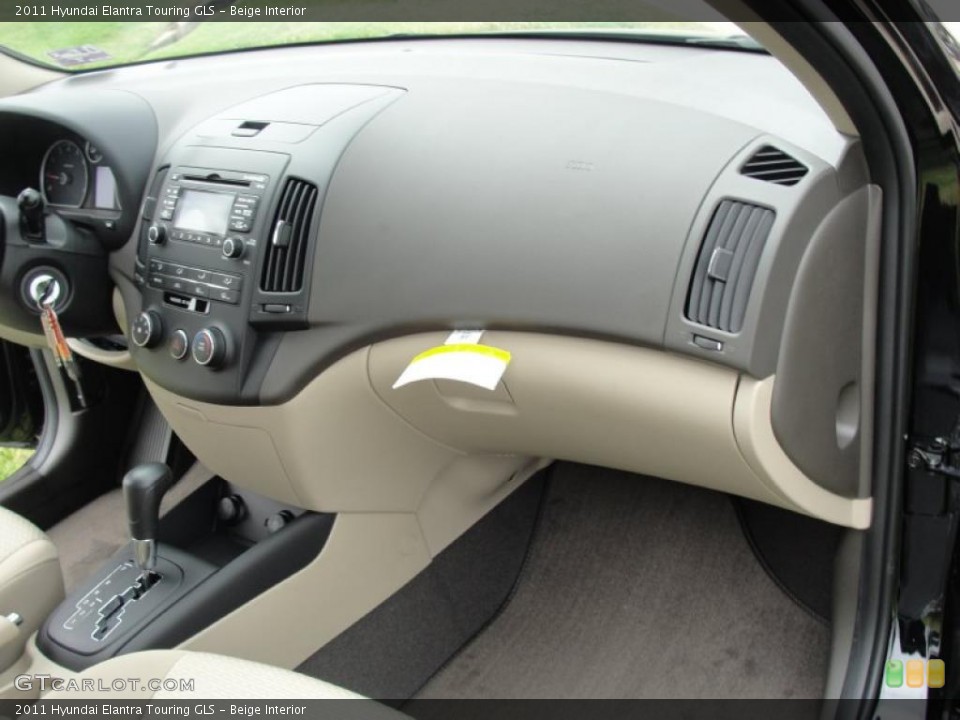 Beige Interior Dashboard for the 2011 Hyundai Elantra Touring GLS #47881442