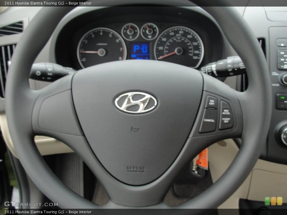Beige Interior Steering Wheel for the 2011 Hyundai Elantra Touring GLS #47881625