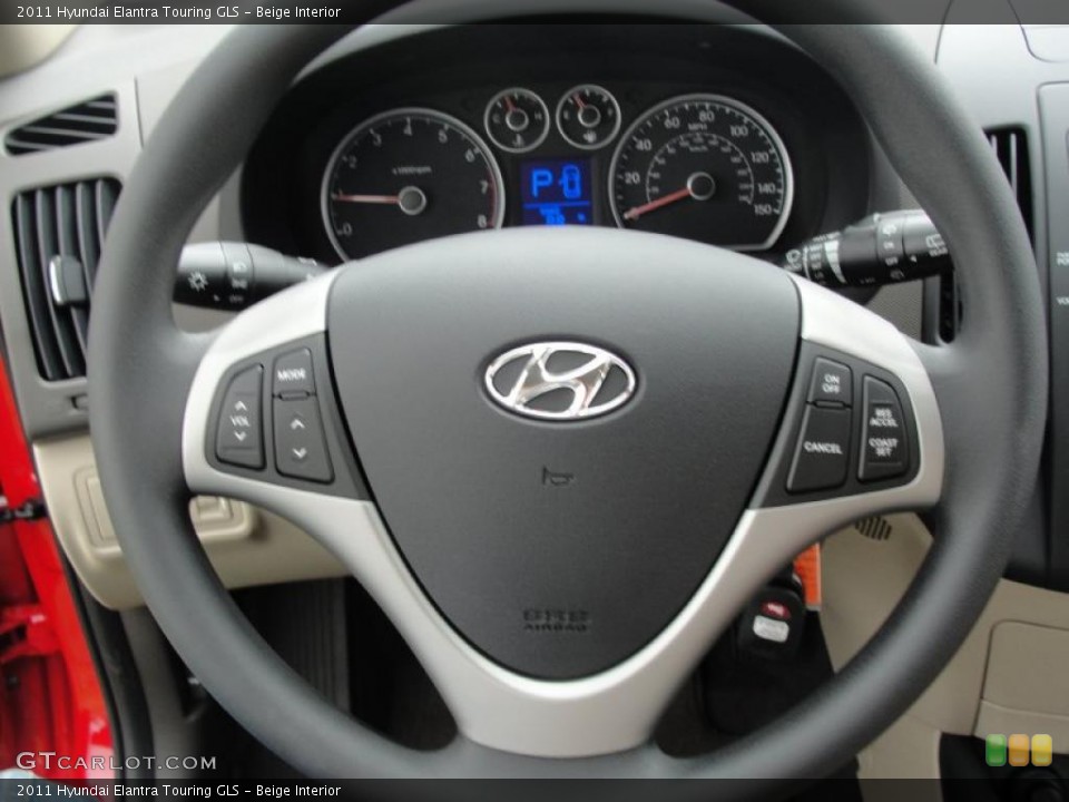 Beige Interior Steering Wheel for the 2011 Hyundai Elantra Touring GLS #47882789