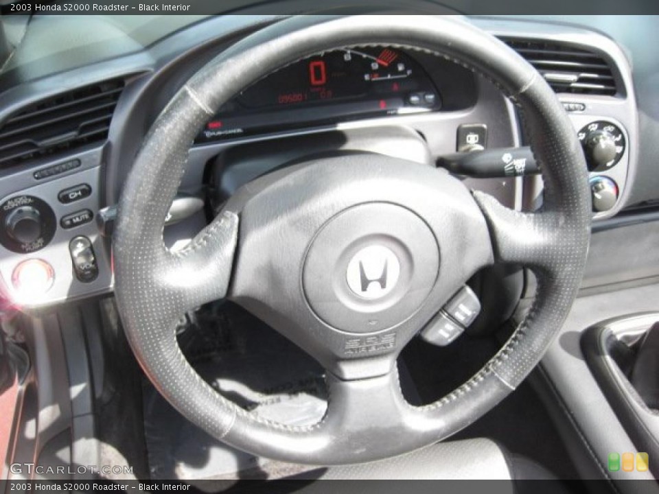 Black Interior Steering Wheel for the 2003 Honda S2000 Roadster #47897261