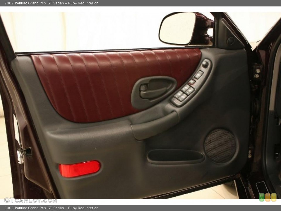 Ruby Red Interior Door Panel for the 2002 Pontiac Grand Prix GT Sedan #47908656