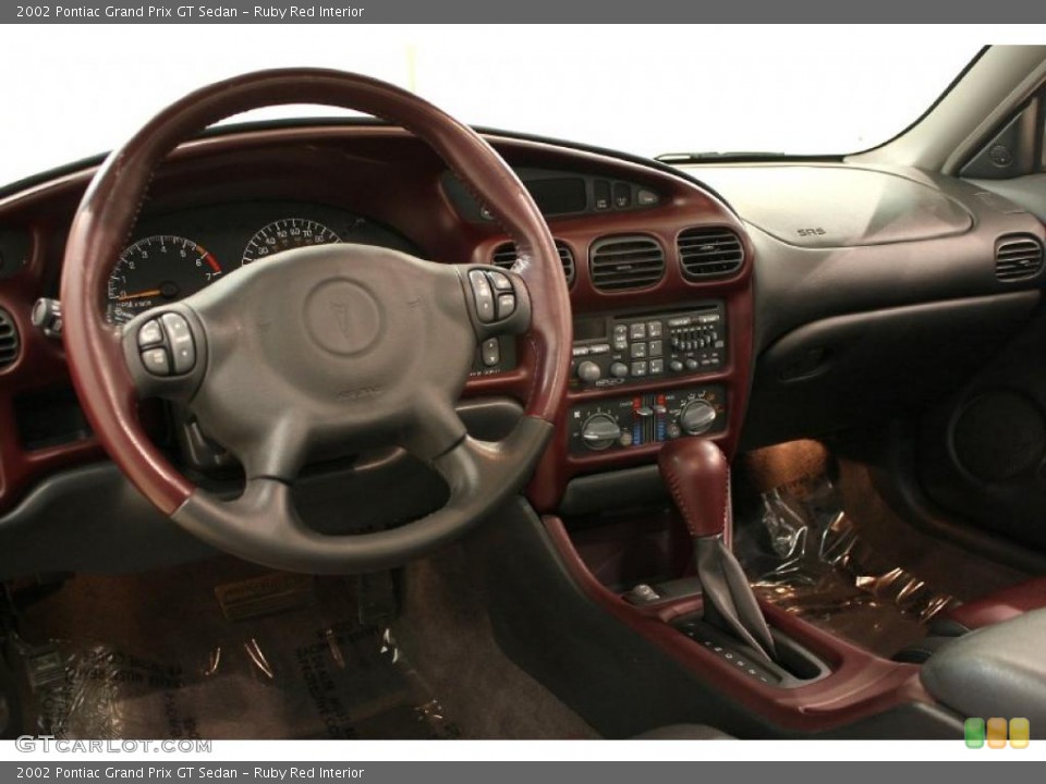 Ruby Red Interior Dashboard for the 2002 Pontiac Grand Prix GT Sedan #47908728