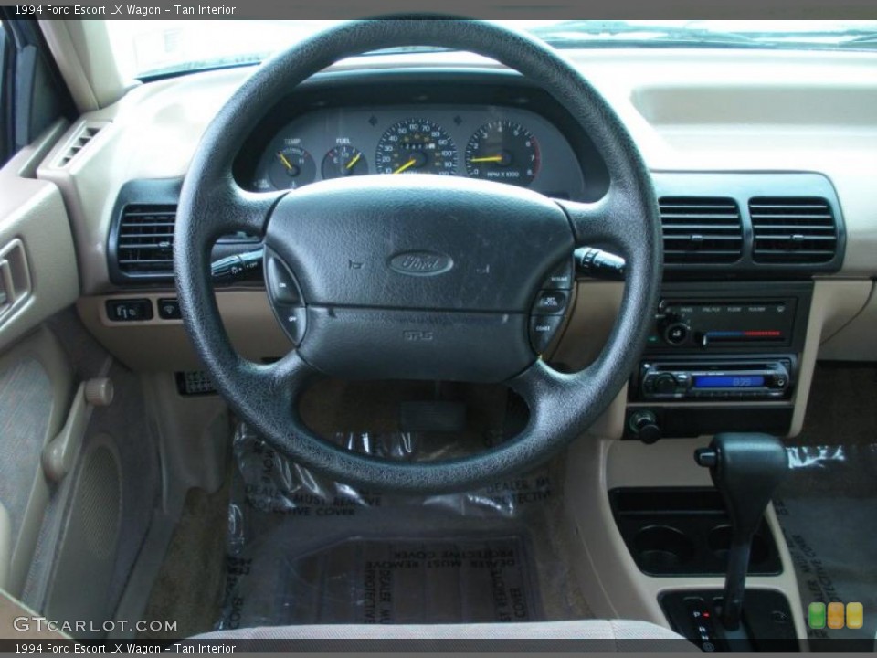 Tan Interior Steering Wheel for the 1994 Ford Escort LX Wagon #47941656