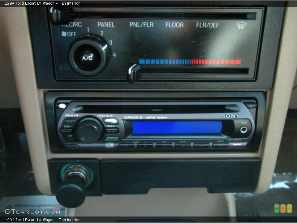 Tan Interior Controls for the 1994 Ford Escort LX Wagon #47941701