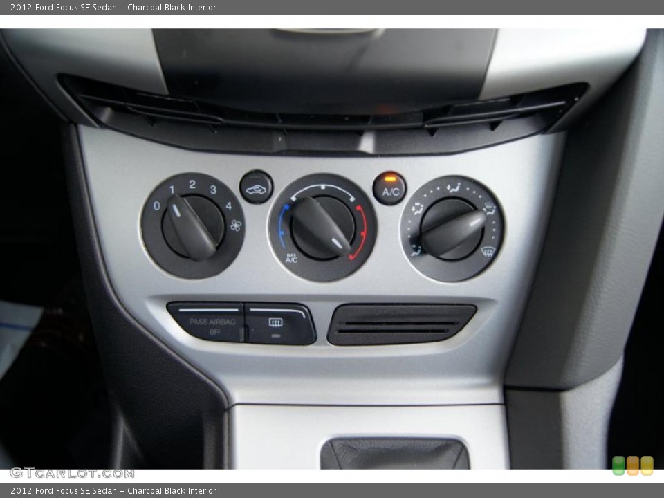 Charcoal Black Interior Controls for the 2012 Ford Focus SE Sedan #47956242