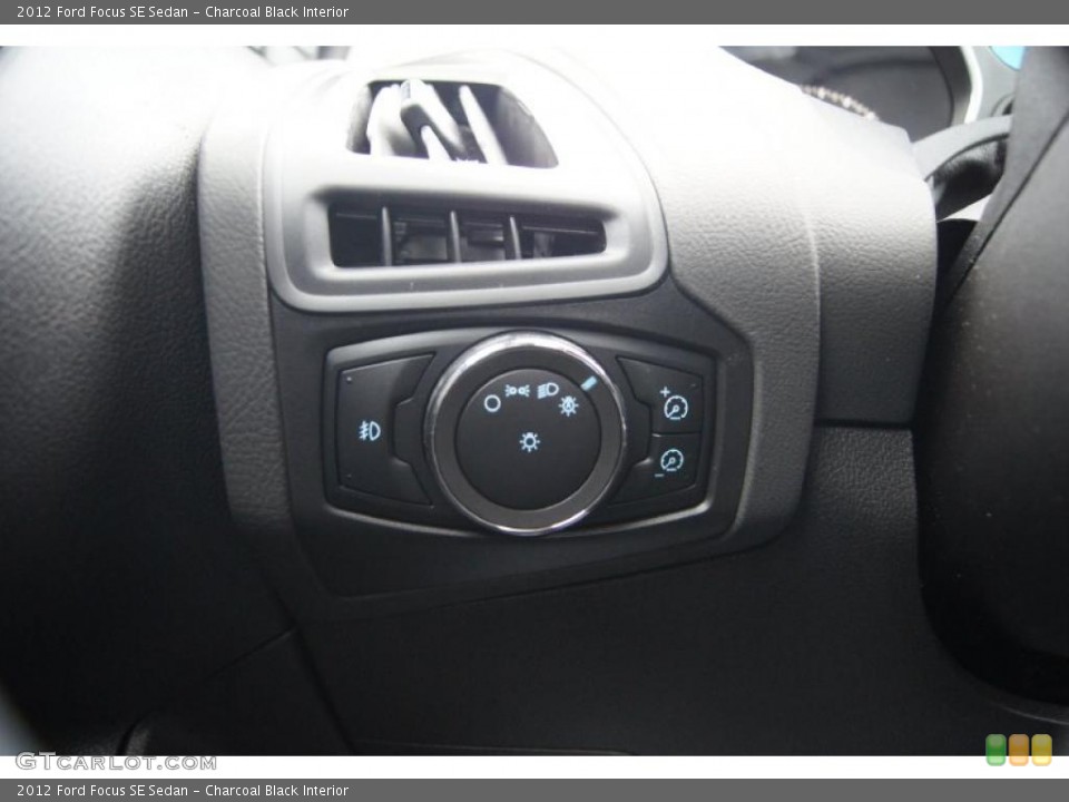 Charcoal Black Interior Controls for the 2012 Ford Focus SE Sedan #47956269