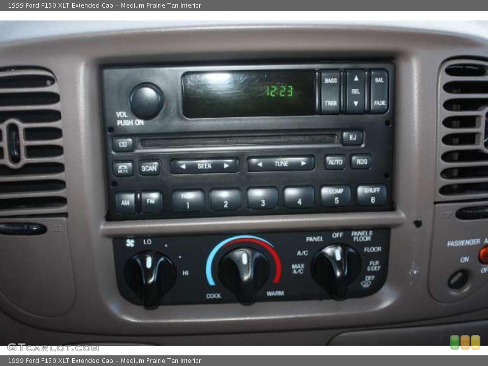 Medium Prairie Tan Interior Controls for the 1999 Ford F150 XLT Extended Cab #47972399