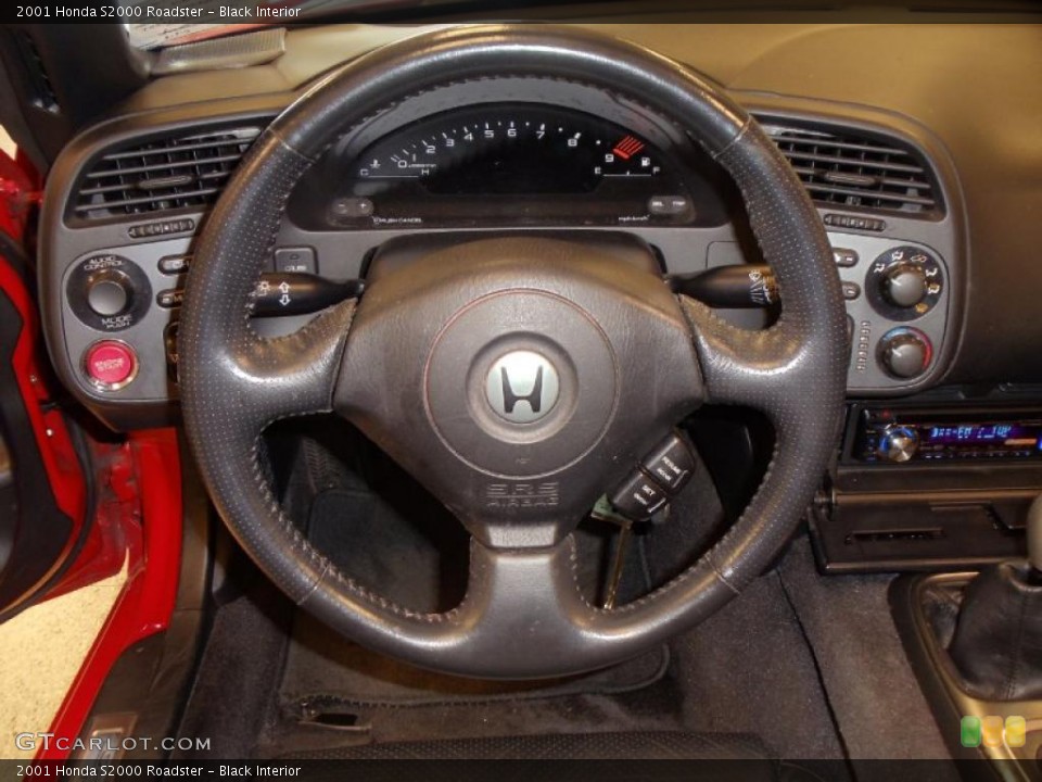 Black Interior Steering Wheel for the 2001 Honda S2000 Roadster #47989674