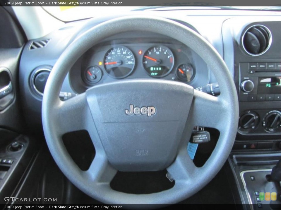 Dark Slate Gray/Medium Slate Gray Interior Steering Wheel for the 2009 Jeep Patriot Sport #47997336