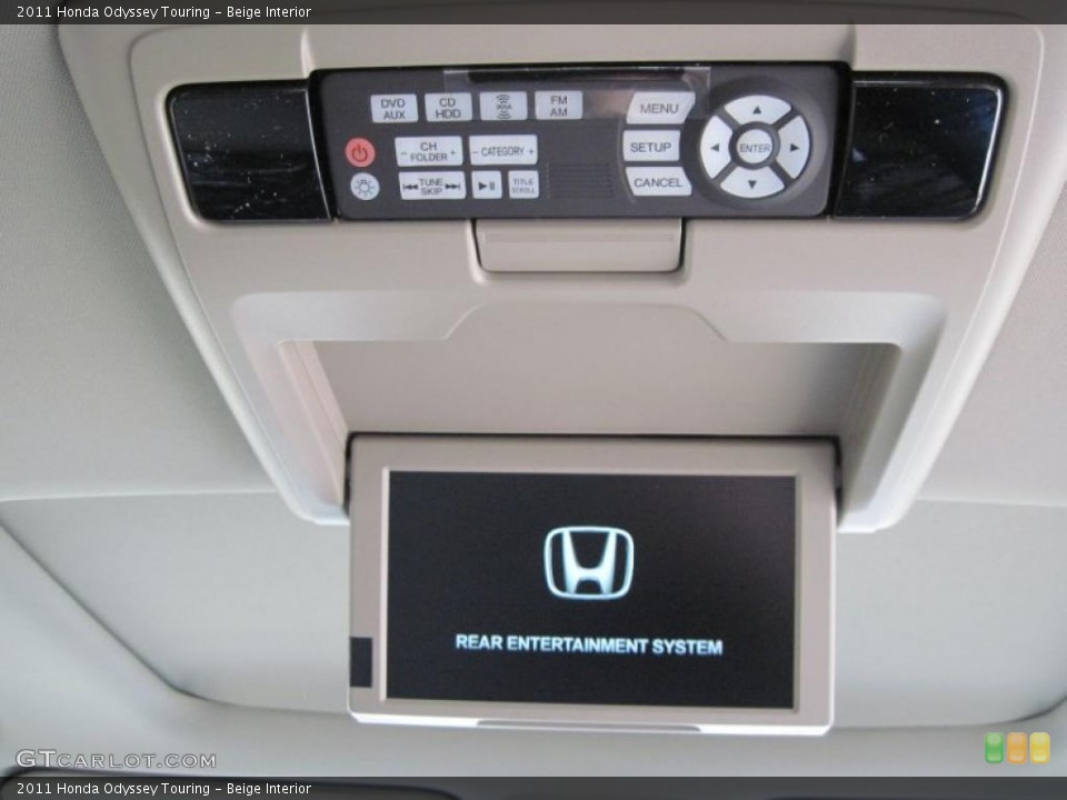 Beige Interior Controls for the 2011 Honda Odyssey Touring #48004593