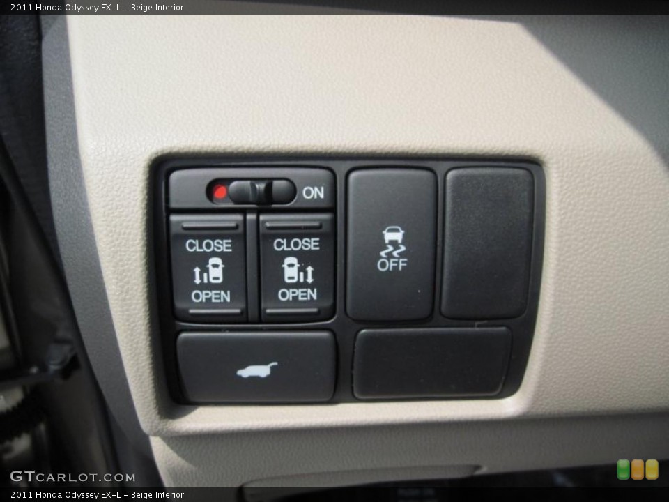 Beige Interior Controls for the 2011 Honda Odyssey EX-L #48004938