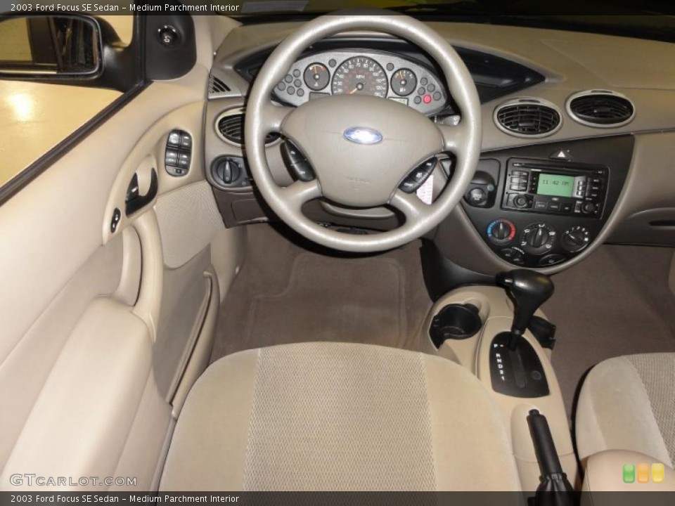 Medium Parchment Interior Dashboard for the 2003 Ford Focus SE Sedan #48016982