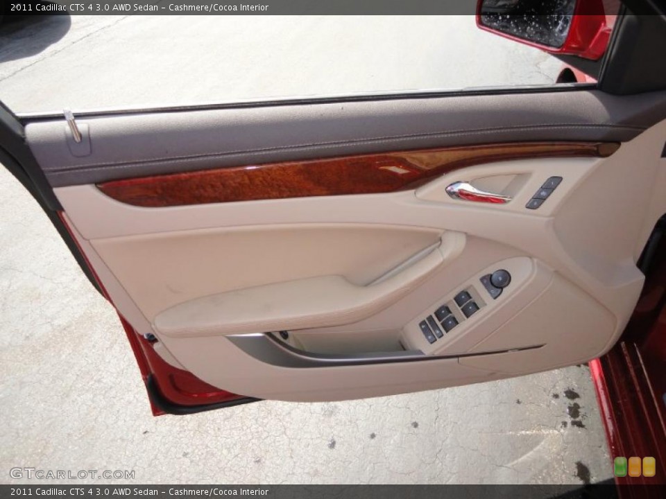 Cashmere/Cocoa Interior Door Panel for the 2011 Cadillac CTS 4 3.0 AWD Sedan #48040574