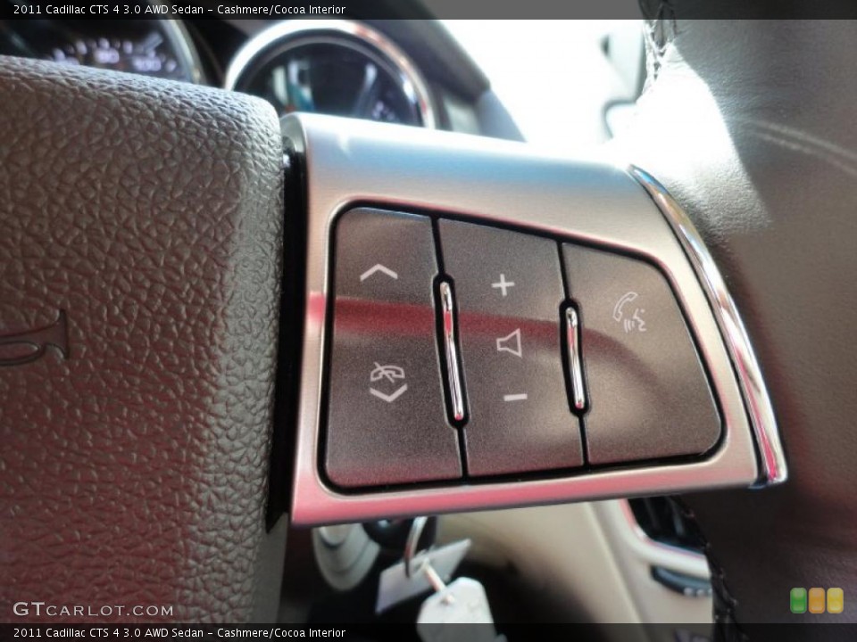 Cashmere/Cocoa Interior Controls for the 2011 Cadillac CTS 4 3.0 AWD Sedan #48040661