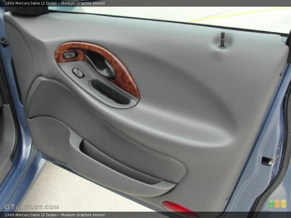 Medium Graphite Interior Door Panel for the 1999 Mercury Sable LS Sedan #48053600