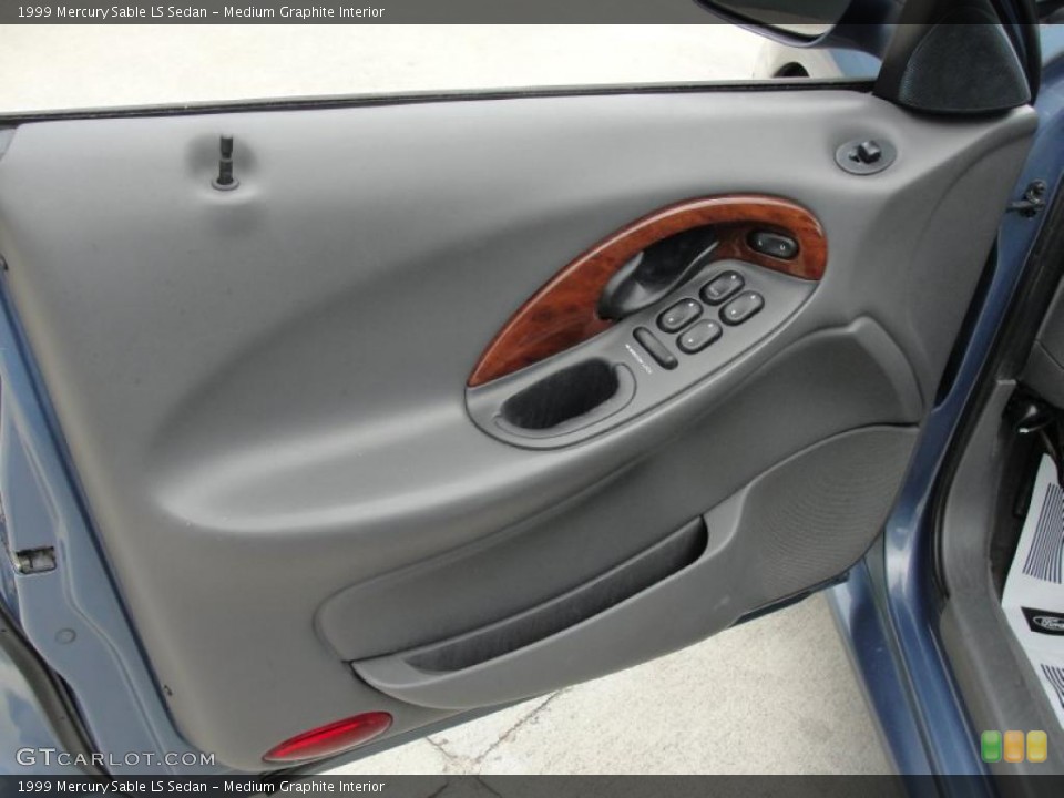Medium Graphite Interior Door Panel for the 1999 Mercury Sable LS Sedan #48053702