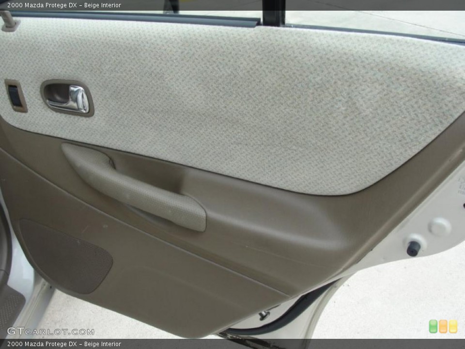 Beige Interior Door Panel for the 2000 Mazda Protege DX #48054284